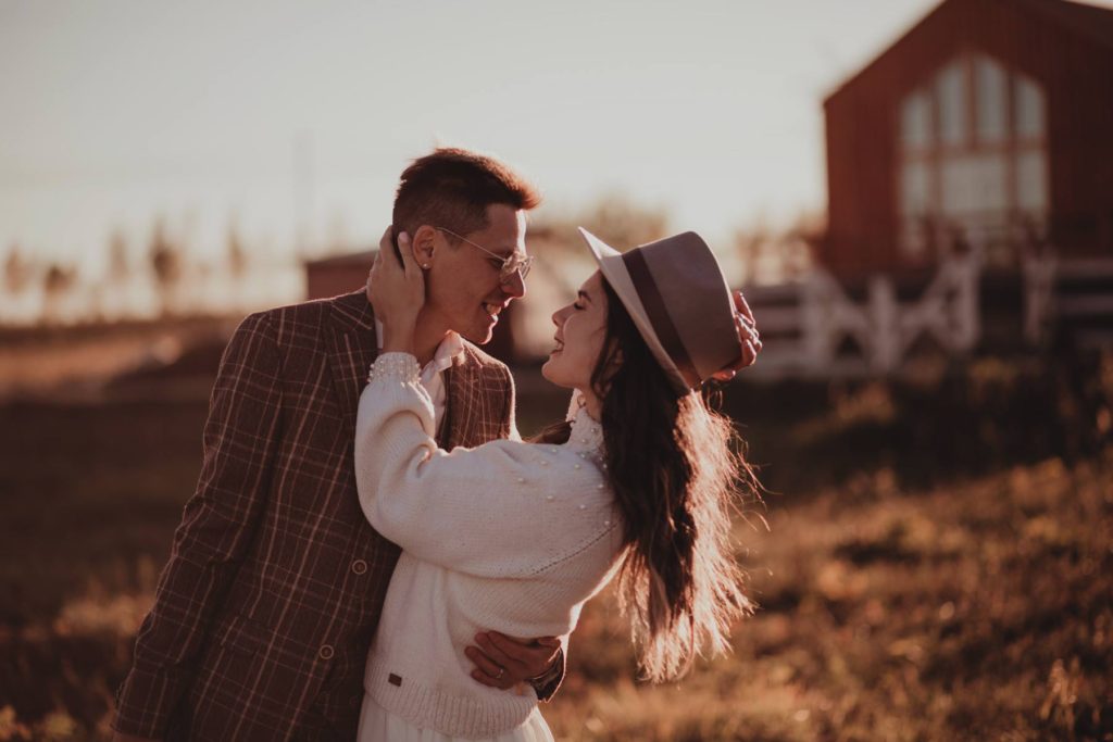 Wedding Professional Photographer in Denver, Colorado. Beautiful bride and groom in a professional photo session ,beautiful bride and groom hugging on the sunset