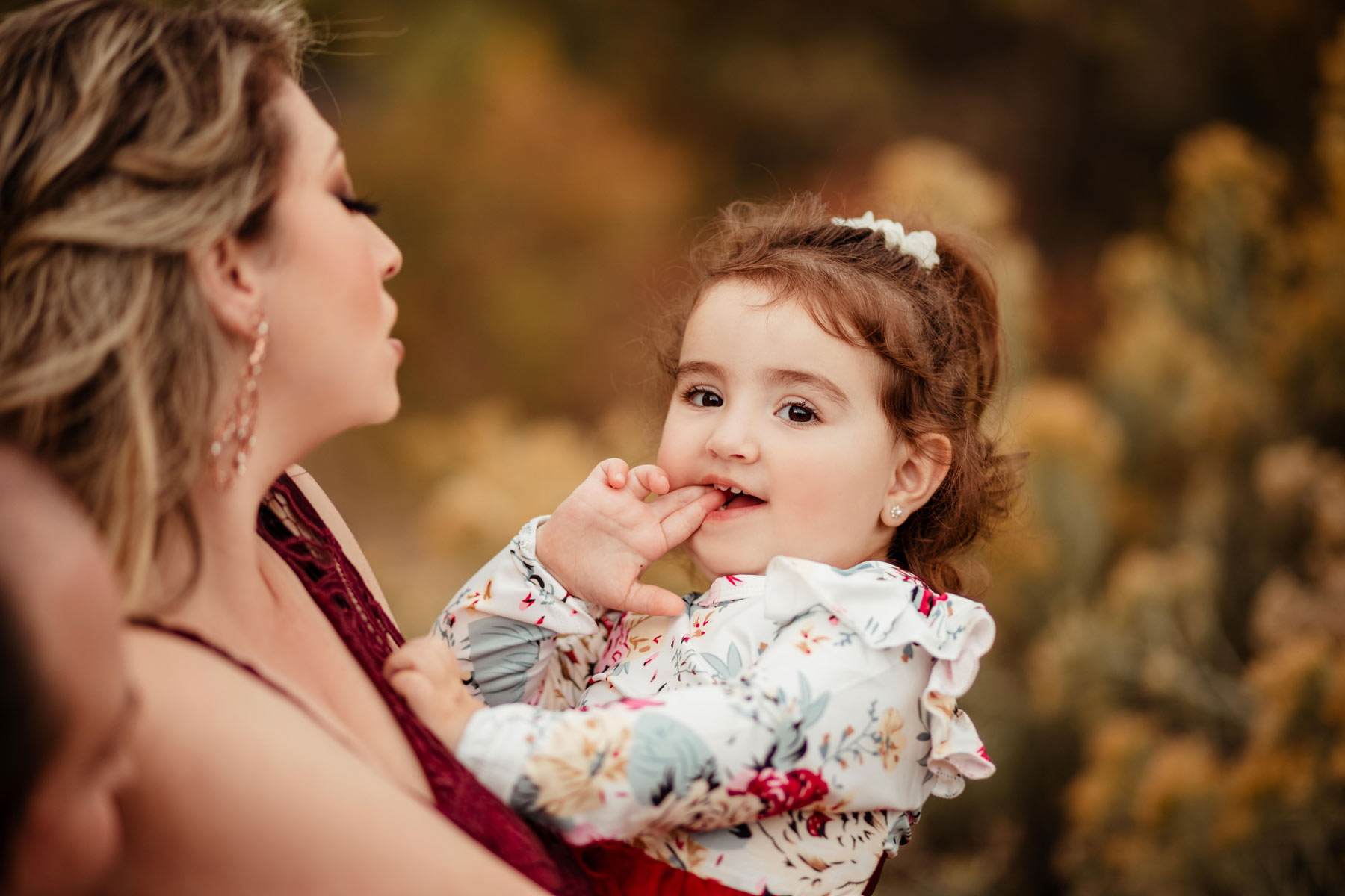 Beautiful baby girl at fall family photo session